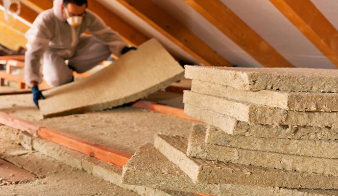 Professional man working with insulation